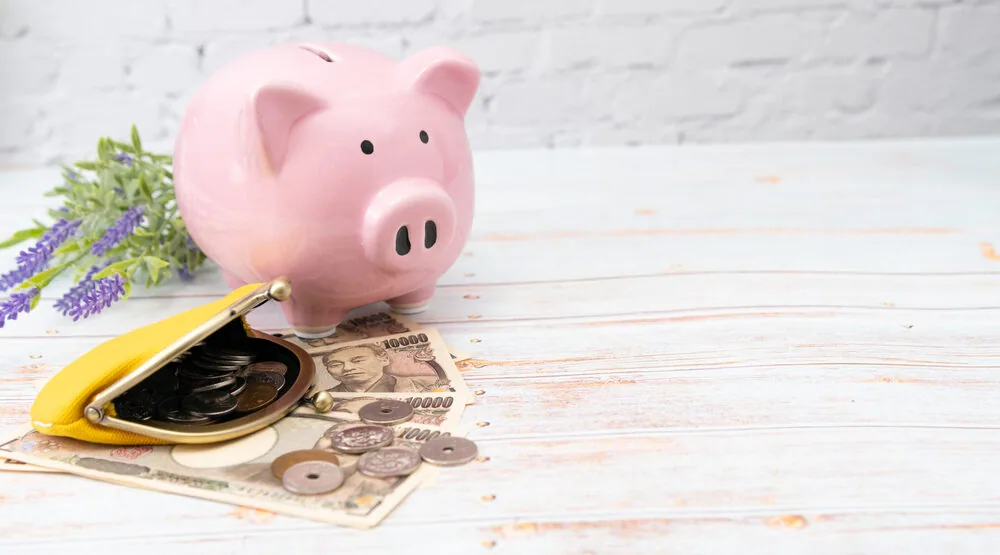 豚の貯金箱 財布とお金